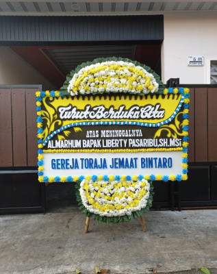 Papan Bunga Duka di Kwandang